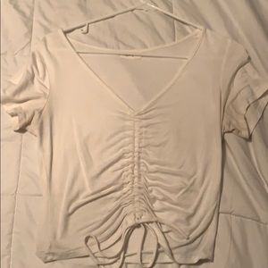 White shoestring top